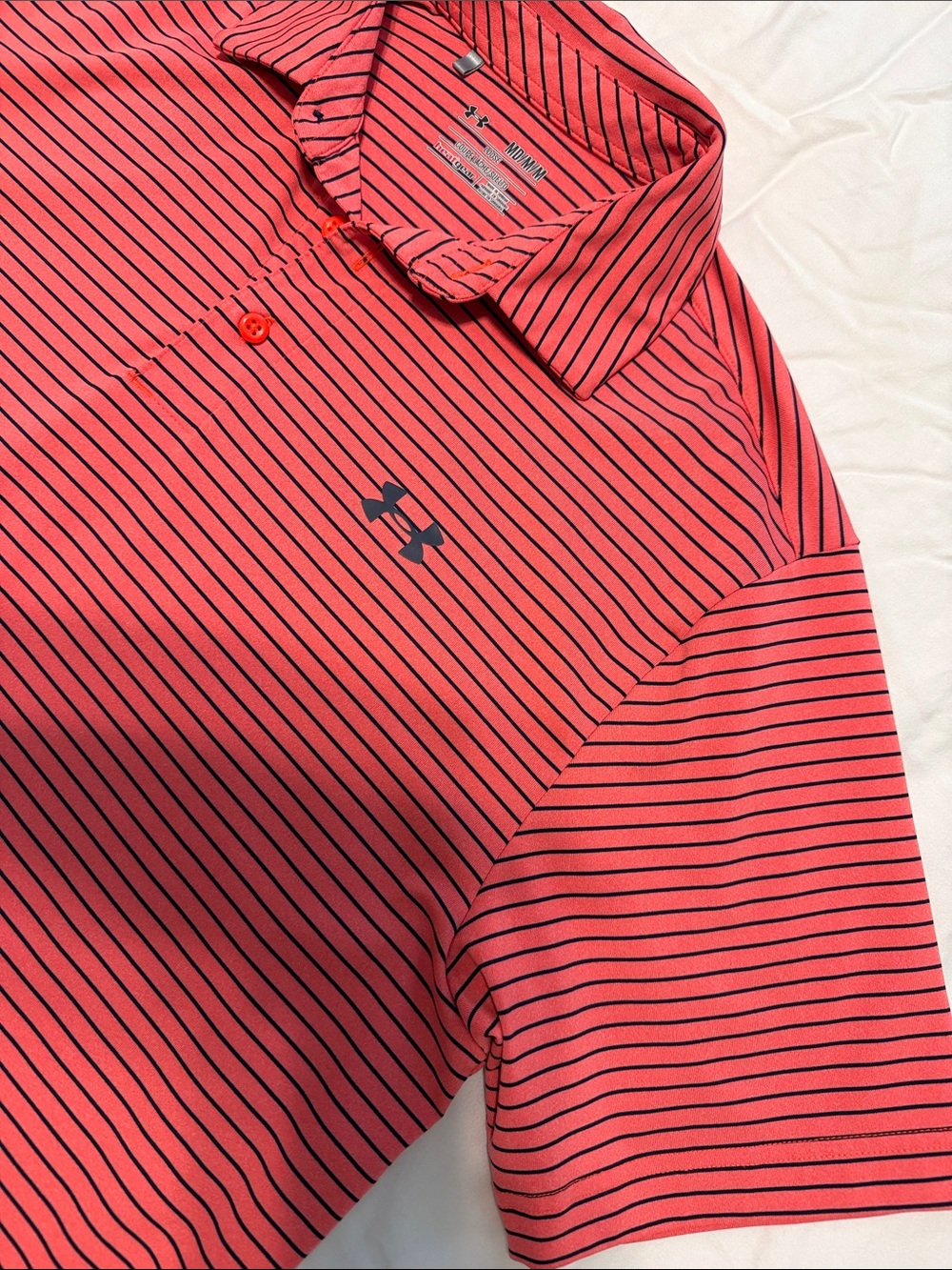Under Armour Men’s Coral Pink with Navy Thin-Strip Polo (M)